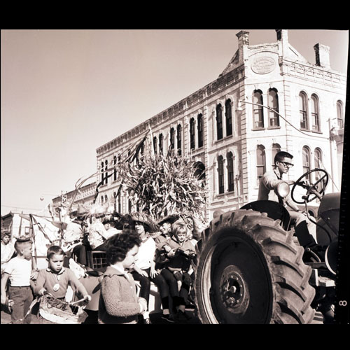 Kids with a tractor in a parade