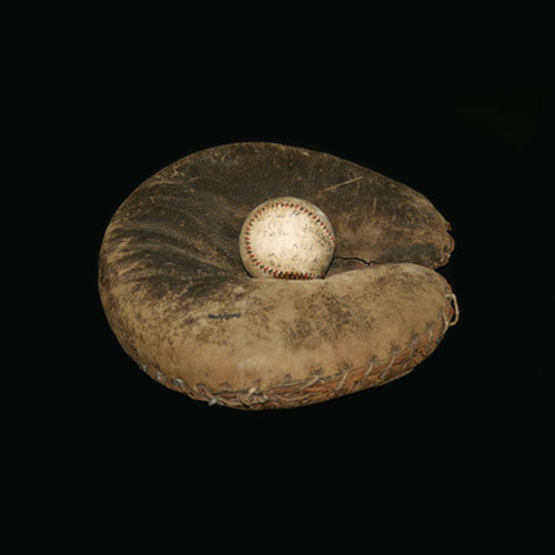 Baseball inside a catcher's mitt