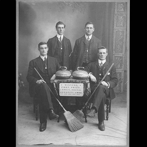 Curlers with brooms and rocks