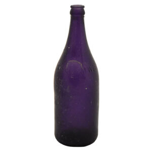 Saugeen Mineral Water bottle. Purple glass.