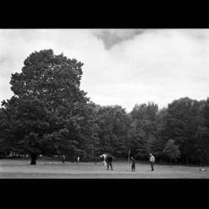 People playing golf.