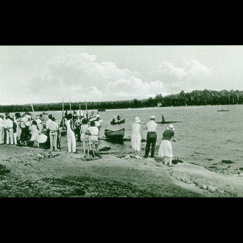 People gathered at regatta.