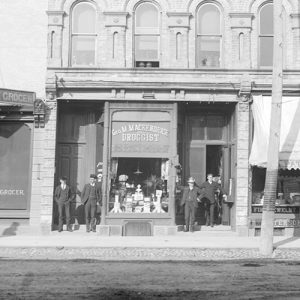 Photo of men outside of store.