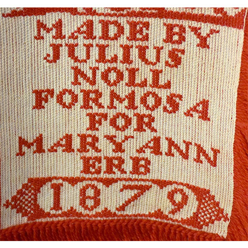 Maker's name and date on coverlet.