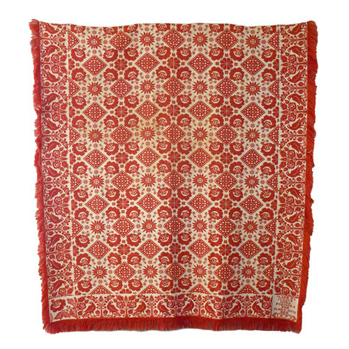 Red and cream coverlet