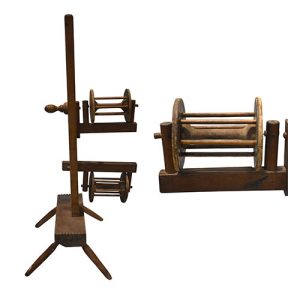 Squirrel cage swift. Floor standing device with round cages for unwinding wool.