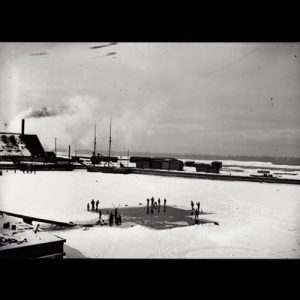 Scene with open ice where harvesting is taking place.