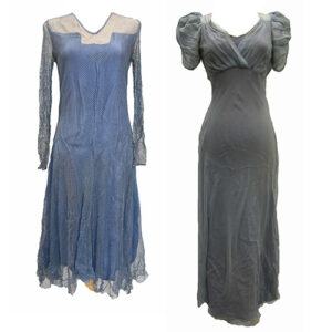 Two 1930s-era dresses. One is a blue, calf-length dress with a sheer grey overlay and long sleeves. The other is a muted purple, ankle-length dress with a sheer grey overlay and short sleeves.
