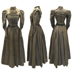 A Victorian-era gown with long sleeves long skirt. The fabric is a brown and grey mottled pattern.
