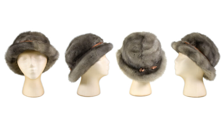 Brown fur hat on fake head