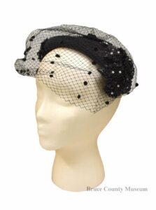 Black hat with a thin vail