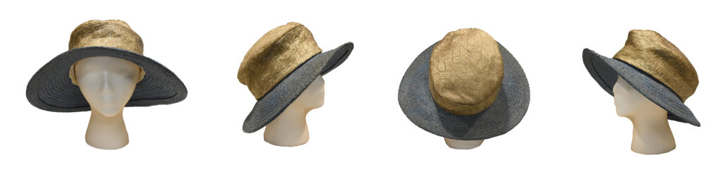 Gold and black hat on fake head