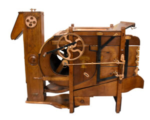 Gerolamy Exhibition Fanning Mill. The apparatus showcases intricate craftsmanship with visible cogs and structural supports